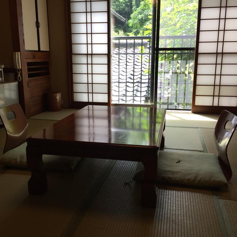 Seifusou Hotel Yufu Kamer foto