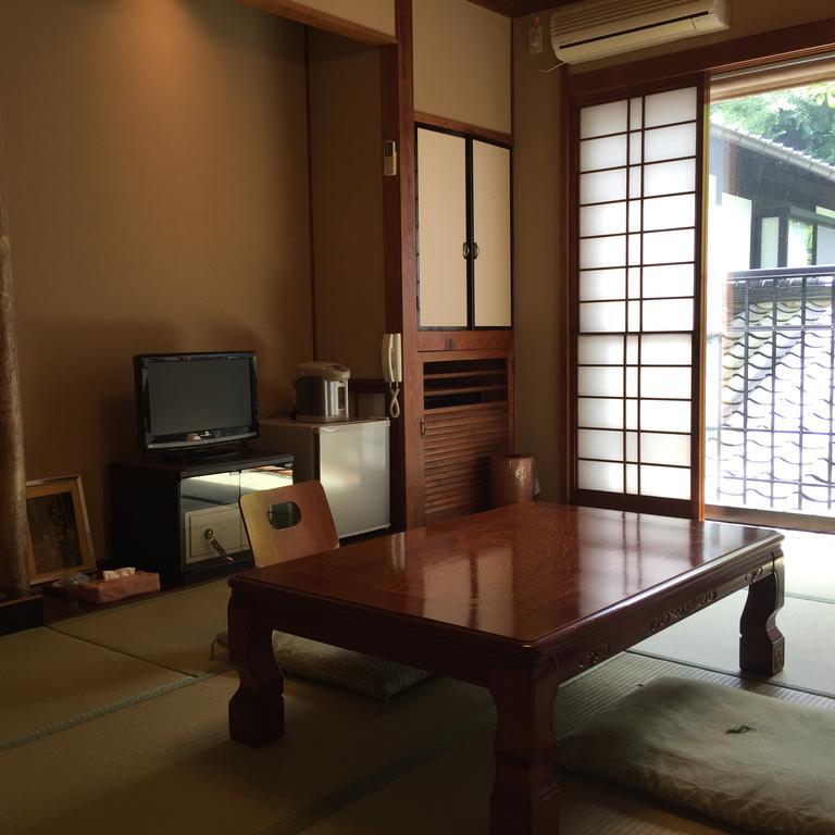 Seifusou Hotel Yufu Kamer foto