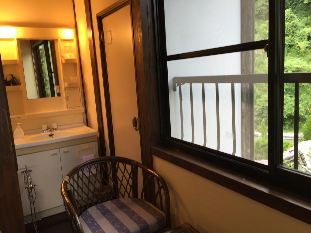 Seifusou Hotel Yufu Kamer foto
