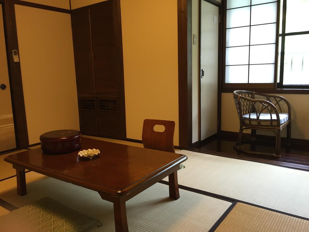 Seifusou Hotel Yufu Kamer foto